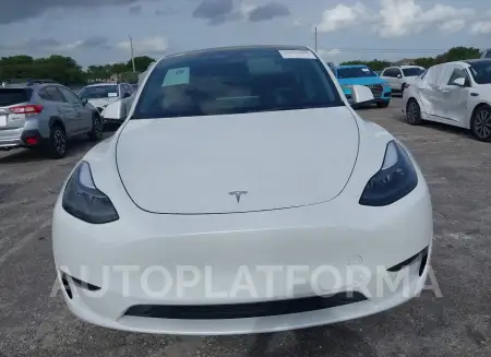 TESLA MODEL Y 2023 vin 7SAYGDEE9PF761733 from auto auction Iaai