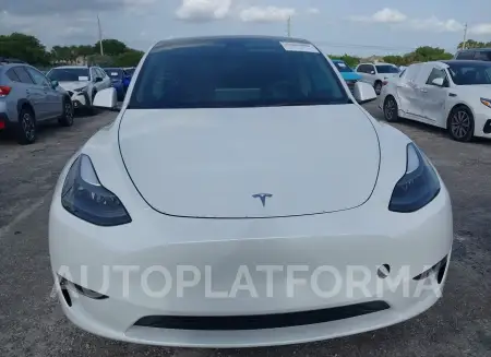 TESLA MODEL Y 2023 vin 7SAYGDEE9PF761733 from auto auction Iaai