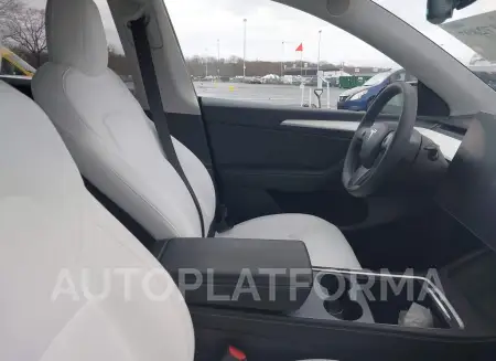 TESLA MODEL Y 2022 vin 7SAYGAEE8NF522413 from auto auction Iaai