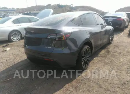 TESLA MODEL Y 2023 vin 7SAYGDEF1PF615142 from auto auction Iaai