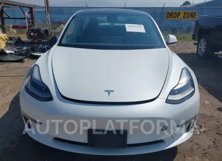 TESLA MODEL 3 2021 vin 5YJ3E1EAXMF028143 from auto auction Iaai