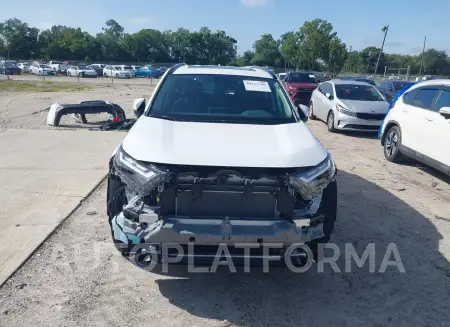 TOYOTA RAV4 HYBRID 2023 vin 4T3RWRFV1PU107299 from auto auction Iaai