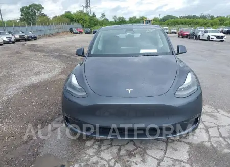 TESLA MODEL Y 2023 vin 7SAYGDEE2PF877629 from auto auction Iaai