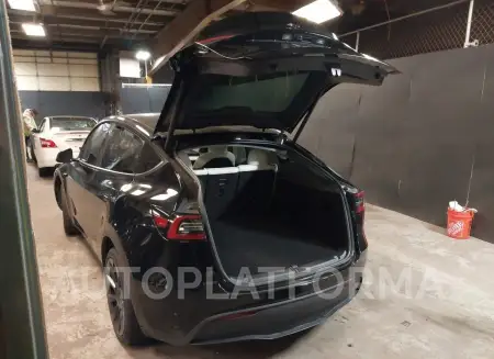 TESLA MODEL Y 2023 vin 7SAYGDEE0PA141429 from auto auction Iaai