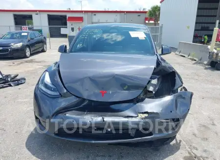 TESLA MODEL Y 2022 vin 7SAYGDEF2NF377699 from auto auction Iaai