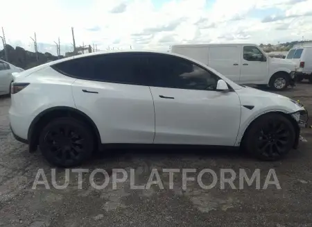 TESLA MODEL Y 2023 vin 7SAYGDEE1PF669192 from auto auction Iaai