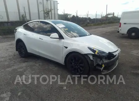 TESLA MODEL Y 2023 vin 7SAYGDEE1PF669192 from auto auction Iaai