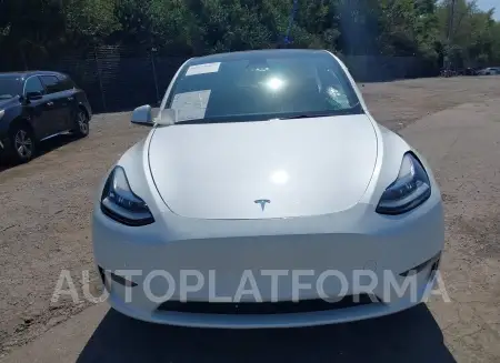 TESLA MODEL Y 2023 vin 7SAYGDEE1PF610711 from auto auction Iaai