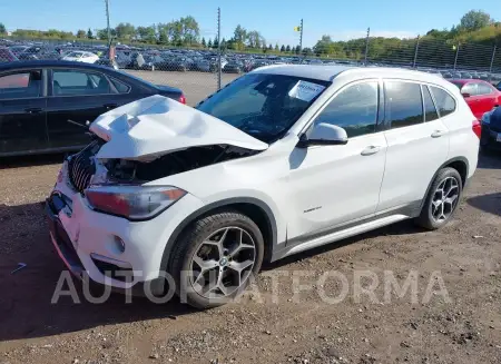 BMW X1 2018 vin WBXHT3C33J5F90173 from auto auction Iaai