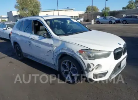 BMW X1 2018 2018 vin WBXHT3C30J5K31473 from auto auction Iaai