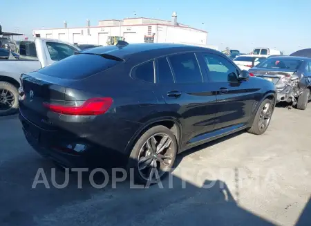 BMW X4 2021 vin 5UX2V5C0XM9G79717 from auto auction Iaai