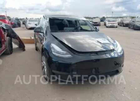 Tesla Model Y 2023 2023 vin 7SAYGDEE9PA135435 from auto auction Iaai