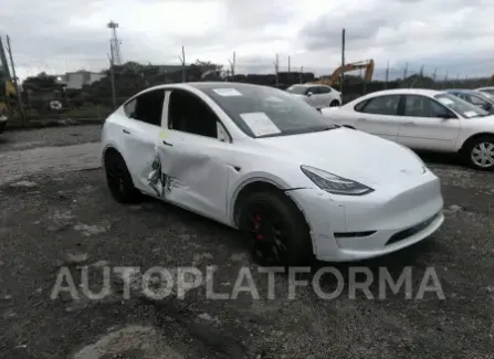 Tesla MODEL Y LONG RANGE AWD 2023 2023 vin 7FAYGDEE1PA128964 from auto auction Iaai