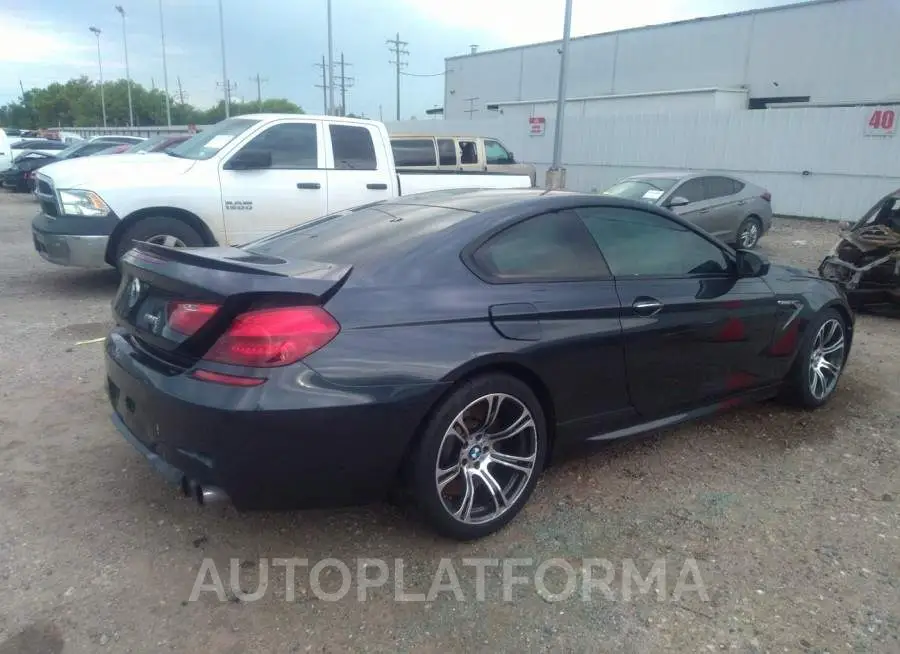 BMW M6 2016 vin WBS6J9C52GD934465 from auto auction Iaai