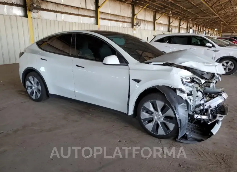 TESLA MODEL Y 2023 vin 7SAYGAEE3PF642820 from auto auction Copart