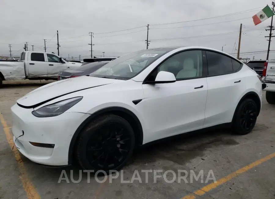 TESLA MODEL Y 2022 vin 7SAYGDEE1NF554234 from auto auction Copart