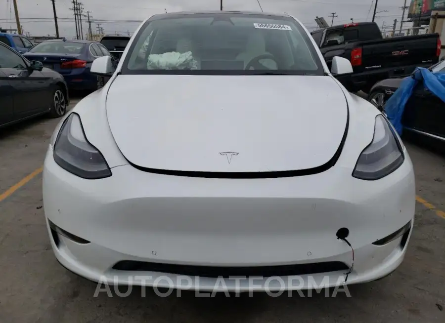 TESLA MODEL Y 2022 vin 7SAYGDEE1NF554234 from auto auction Copart