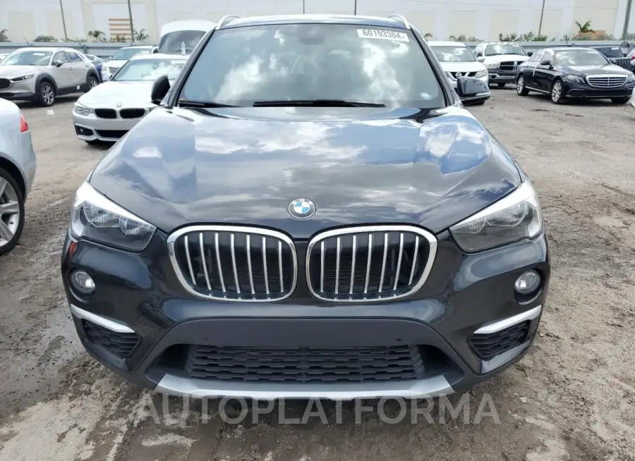 BMW X1 XDRIVE2 2019 vin WBXHT3C58K5L36670 from auto auction Copart