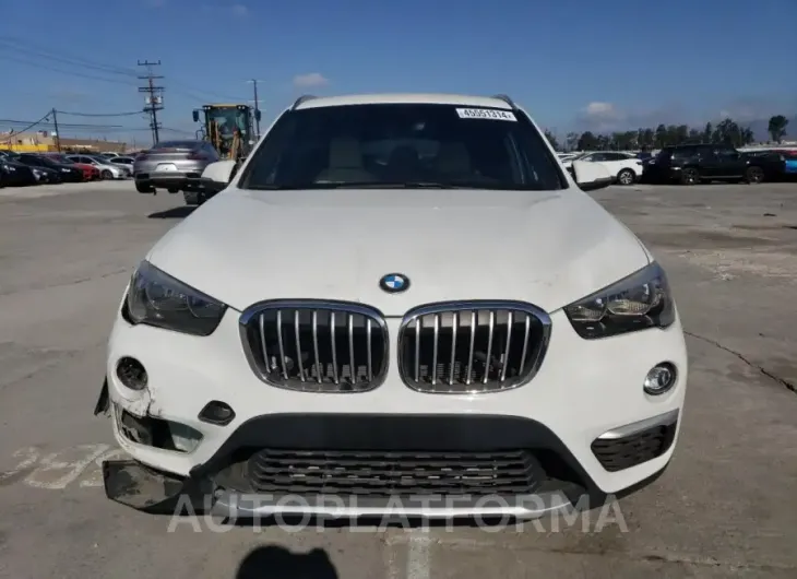 BMW X1 XDRIVE2 2018 vin WBXHT3C37J5L24815 from auto auction Copart