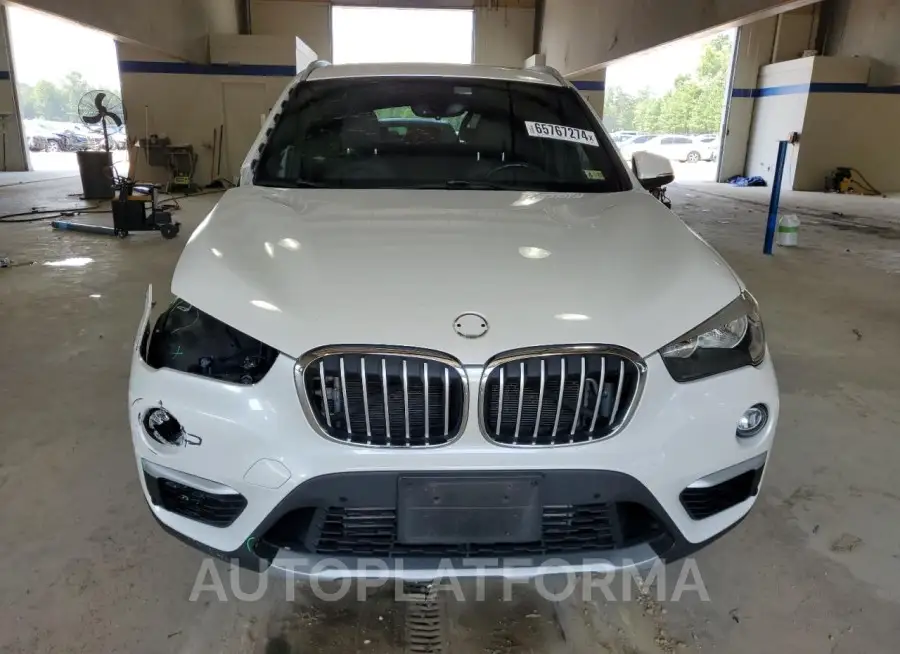 BMW X1 XDRIVE2 2018 vin WBXHT3C35J5K25426 from auto auction Copart