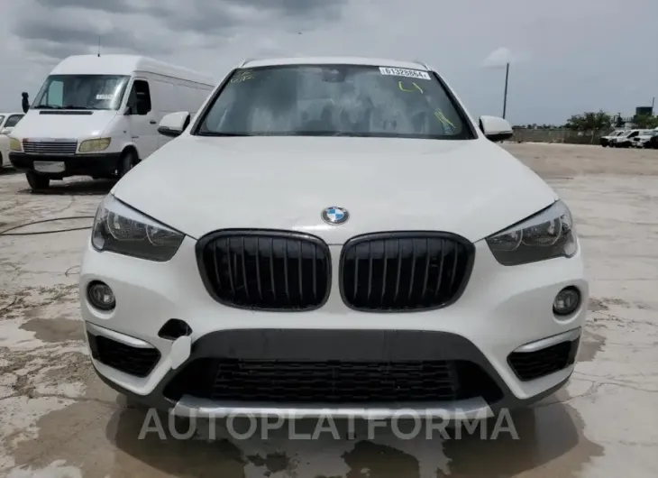 BMW X1 XDRIVE2 2019 vin WBXHT3C57K5L89862 from auto auction Copart