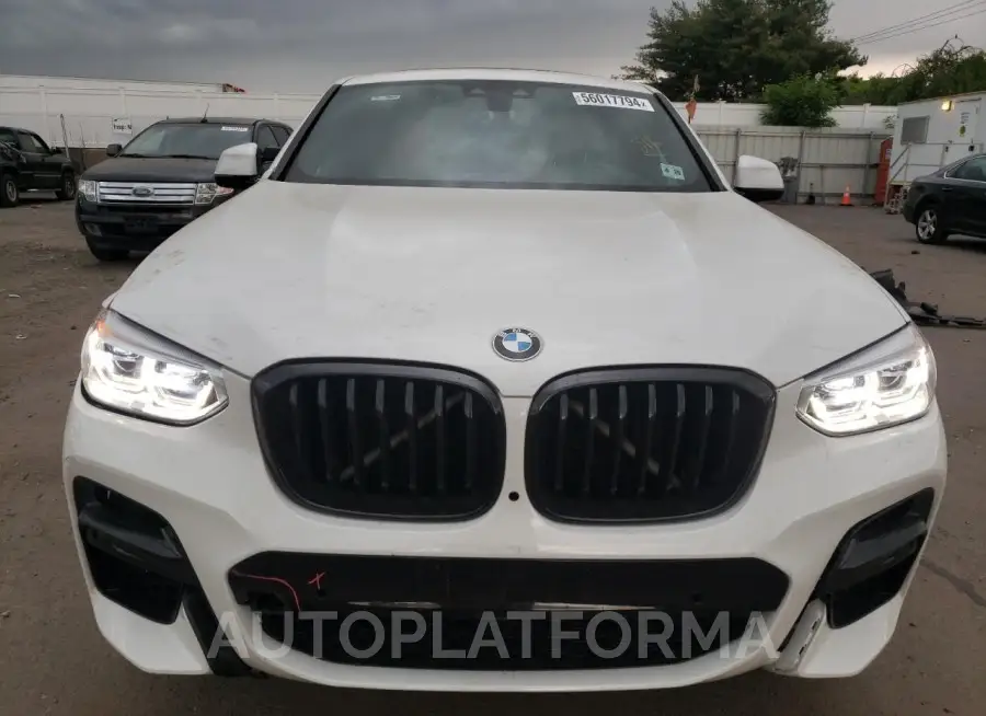 BMW X4 XDRIVEM 2021 vin 5UX2V5C00M9G61145 from auto auction Copart