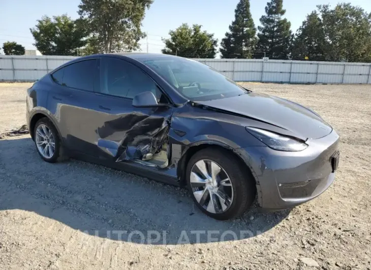 TESLA MODEL Y 2023 vin 7SAYGDED0PF977901 from auto auction Copart