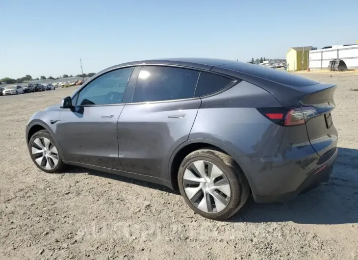 TESLA MODEL Y 2023 vin 7SAYGDED0PF977901 from auto auction Copart