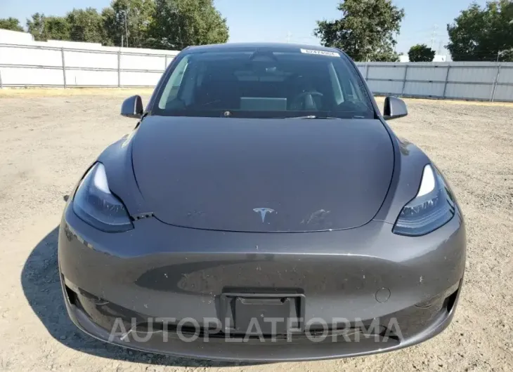 TESLA MODEL Y 2023 vin 7SAYGDED0PF977901 from auto auction Copart