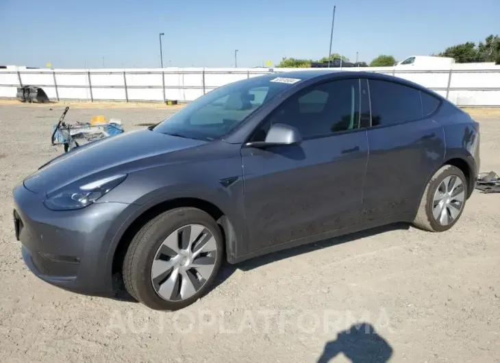 TESLA MODEL Y 2023 vin 7SAYGDED0PF977901 from auto auction Copart