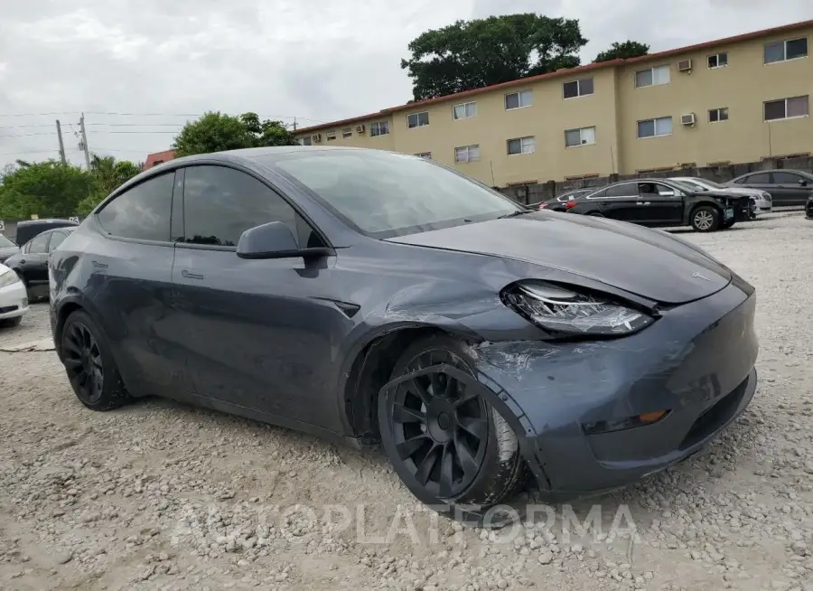 TESLA MODEL Y 2023 vin 7SAYGDEE5PA026115 from auto auction Copart