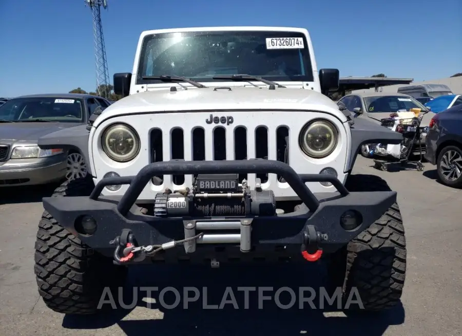 JEEP WRANGLER U 2015 vin 1C4HJWDG3FL585027 from auto auction Copart