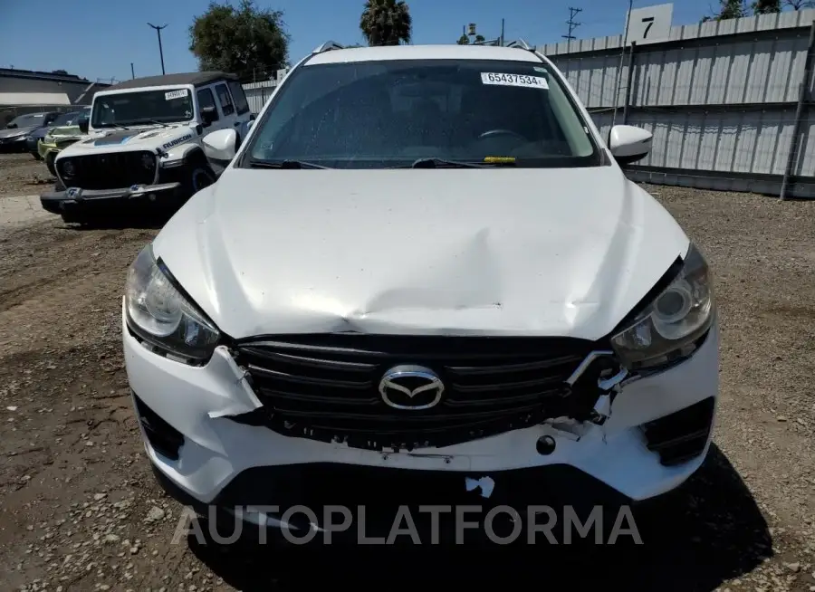 MAZDA cx-5 sport 2016 vin JM3KE2BY0G0670089 from auto auction Copart