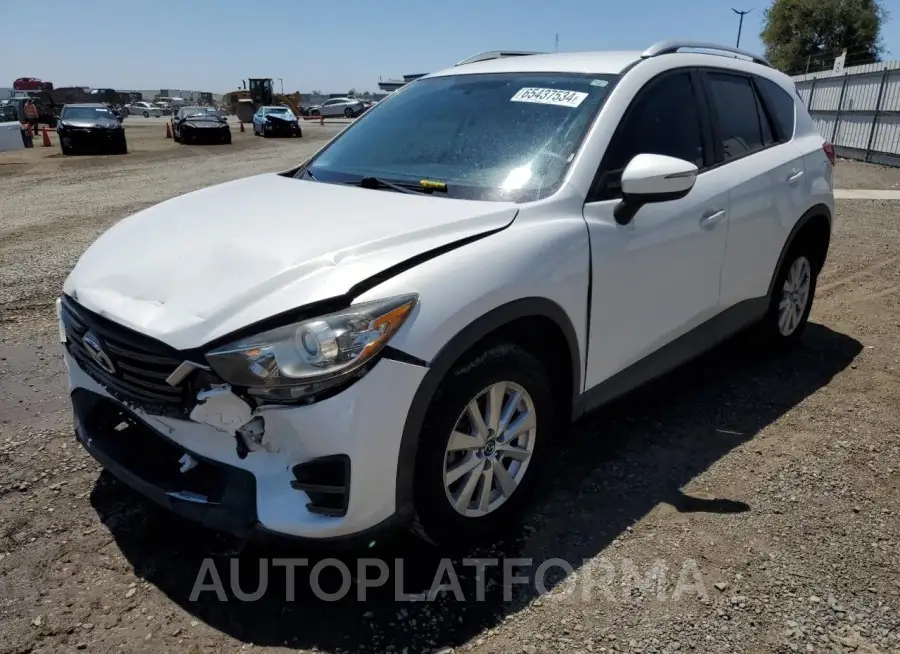 MAZDA cx-5 sport 2016 vin JM3KE2BY0G0670089 from auto auction Copart