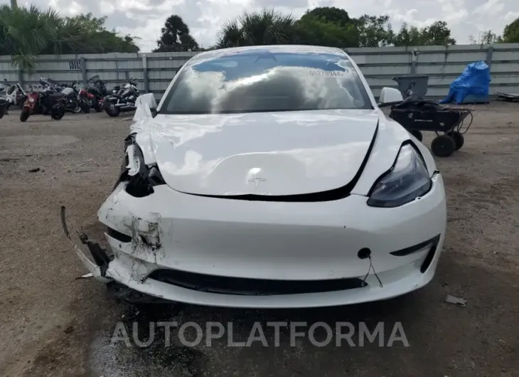 TESLA MODEL 3 2021 vin 5YJ3E1EA5MF092087 from auto auction Copart