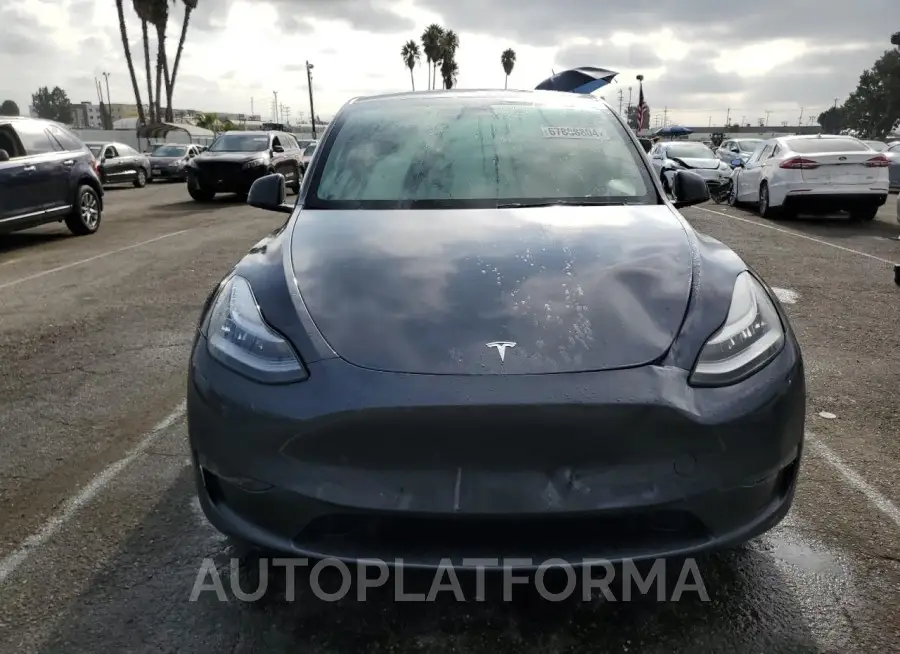 TESLA MODEL Y 2023 vin 7SAYGDEE6PA030576 from auto auction Copart