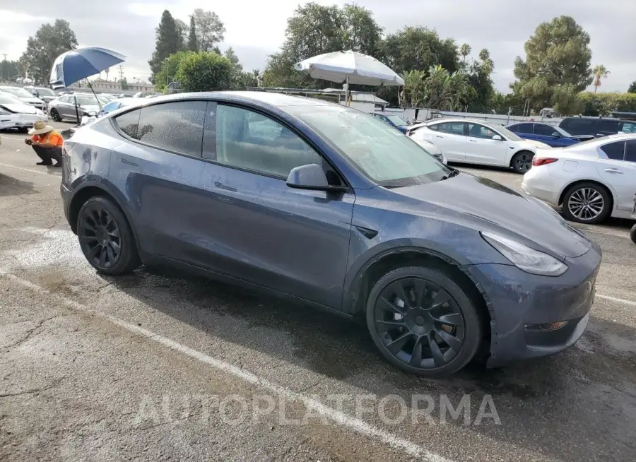 TESLA MODEL Y 2023 vin 7SAYGDEE6PA030576 from auto auction Copart