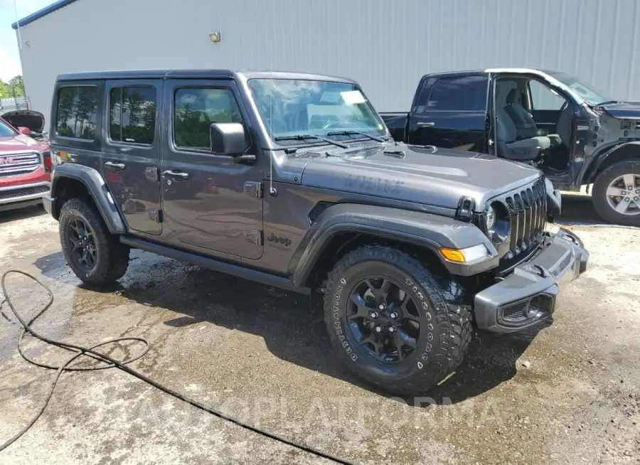 JEEP WRANGLER U 2021 vin 1C4HJXDG2MW557477 from auto auction Copart