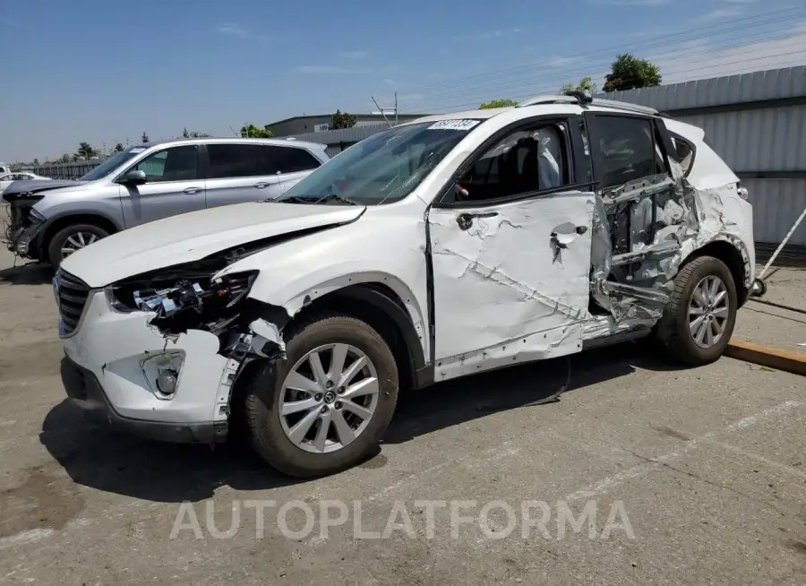 MAZDA CX-5 TOURI 2016 vin JM3KE2CY9G0760811 from auto auction Copart