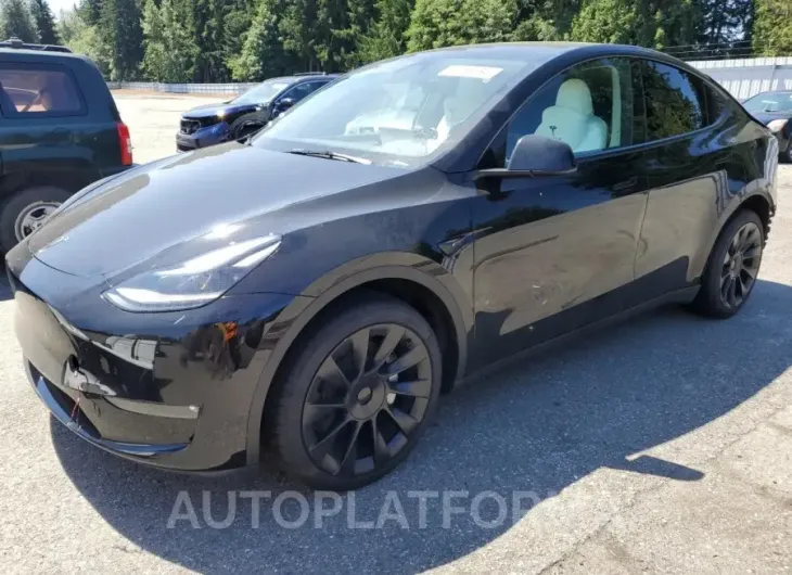 TESLA MODEL Y 2023 vin 7SAYGAEE0PF838827 from auto auction Copart