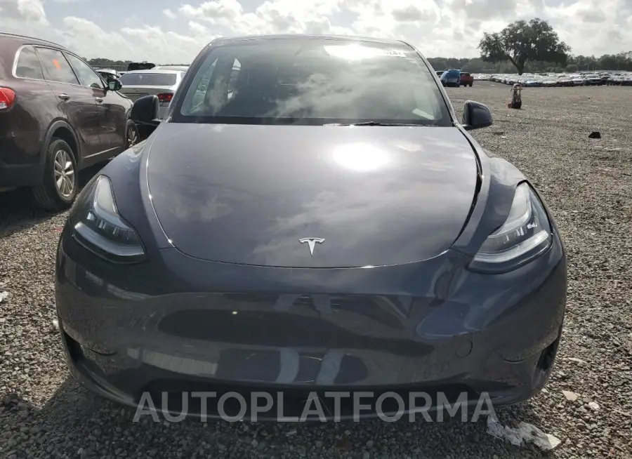 TESLA MODEL Y 2023 vin 7SAYGDEE0PA142757 from auto auction Copart