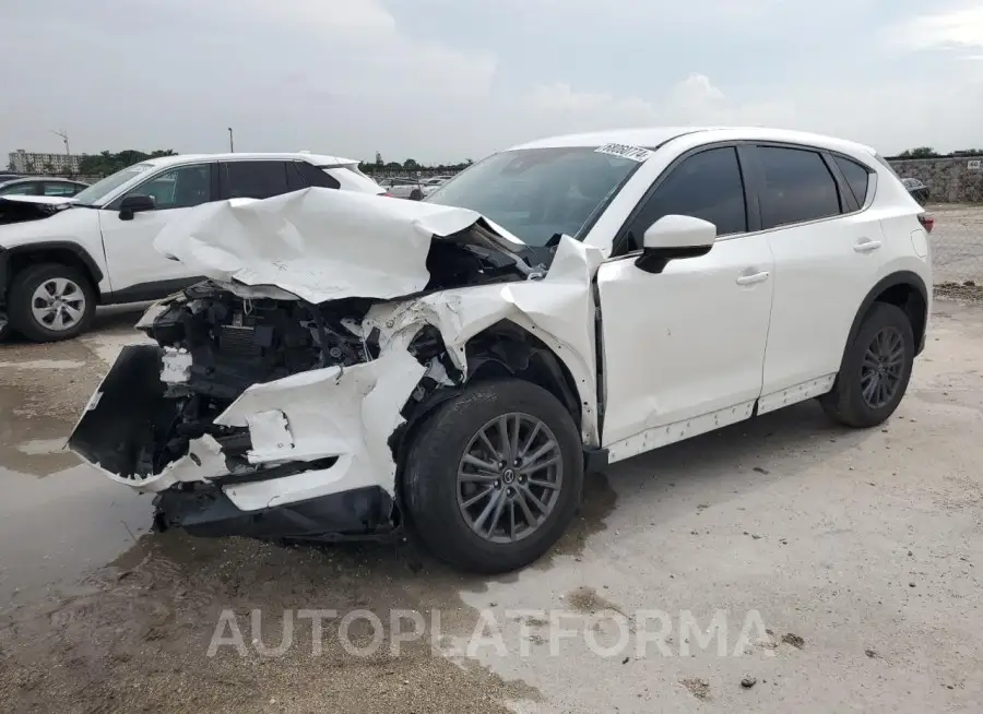 MAZDA cx-5 sport 2021 vin JM3KFABMXM0360239 from auto auction Copart