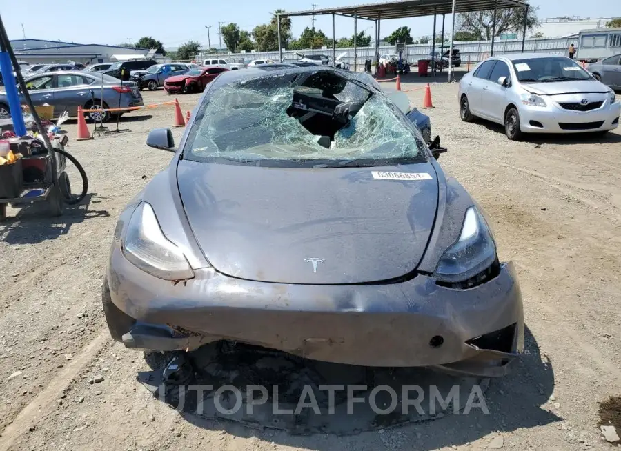 TESLA MODEL 3 2023 vin 5YJ3E1EA7PF651790 from auto auction Copart