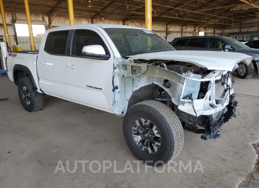 TOYOTA TACOMA DOU 2023 vin 3TMCZ5ANXPM550114 from auto auction Copart