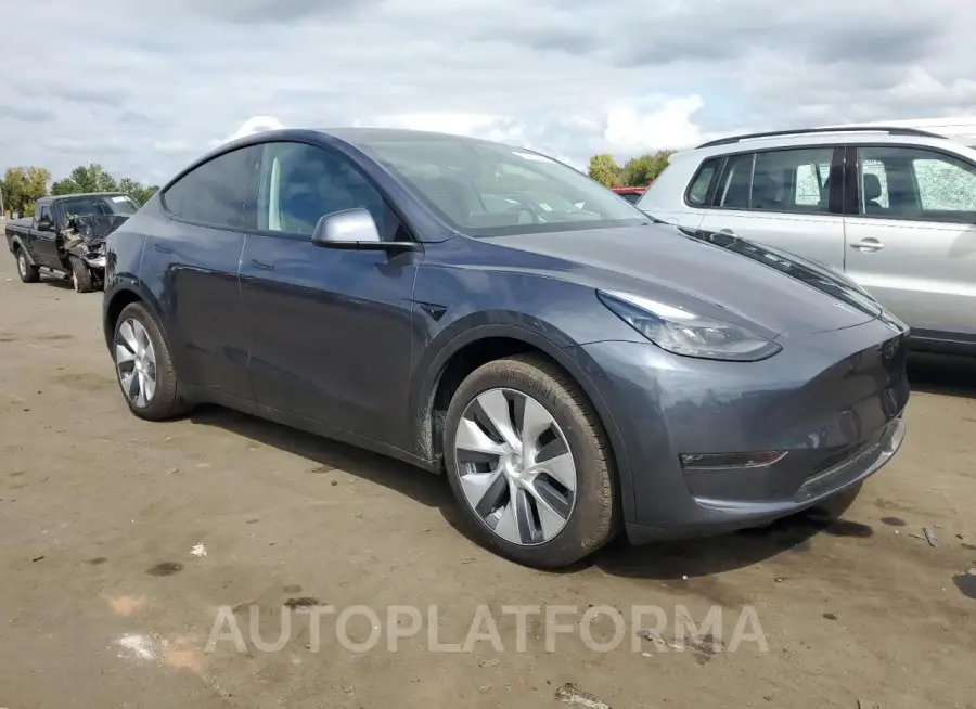 TESLA MODEL Y 2023 vin 7SAYGDED3PF931575 from auto auction Copart