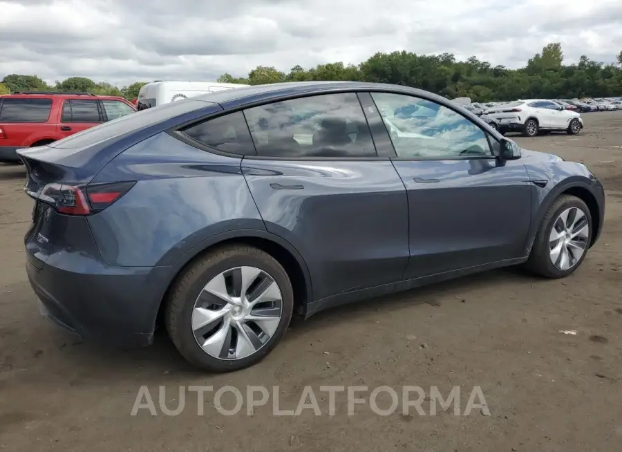 TESLA MODEL Y 2023 vin 7SAYGDED3PF931575 from auto auction Copart