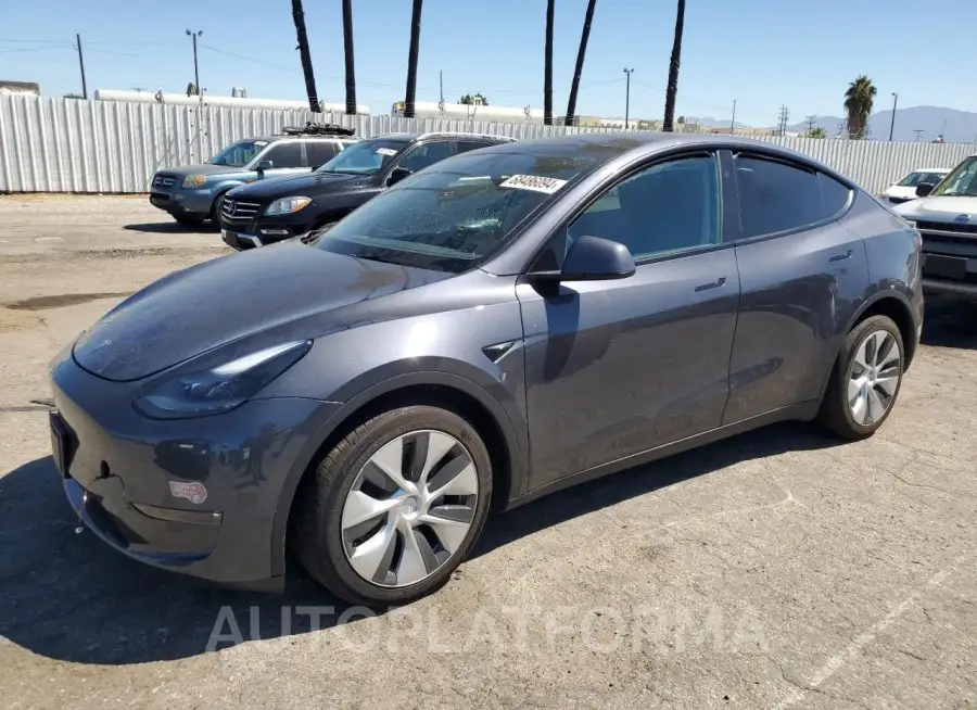 TESLA MODEL Y 2023 vin 7SAYGDED5PF977733 from auto auction Copart