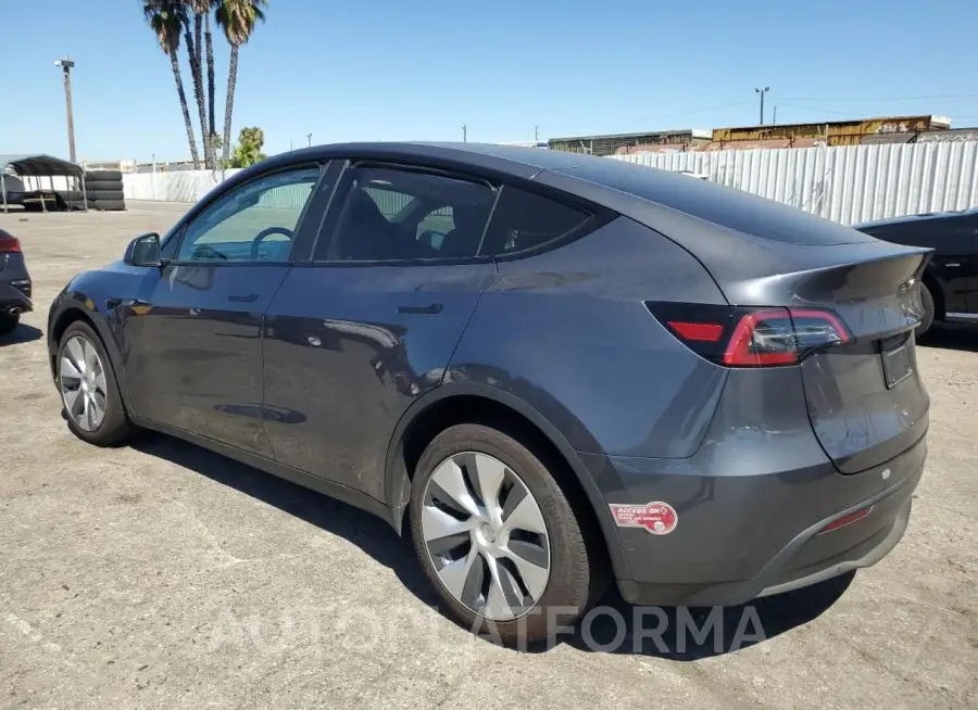 TESLA MODEL Y 2023 vin 7SAYGDED5PF977733 from auto auction Copart