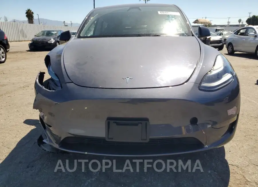 TESLA MODEL Y 2023 vin 7SAYGDED5PF977733 from auto auction Copart