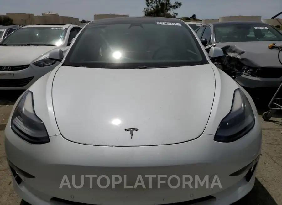 TESLA MODEL 3 2021 vin 5YJ3E1EB2MF004136 from auto auction Copart